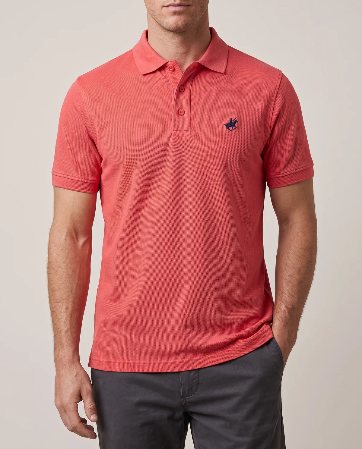 Piqué Polo in Coral, worn