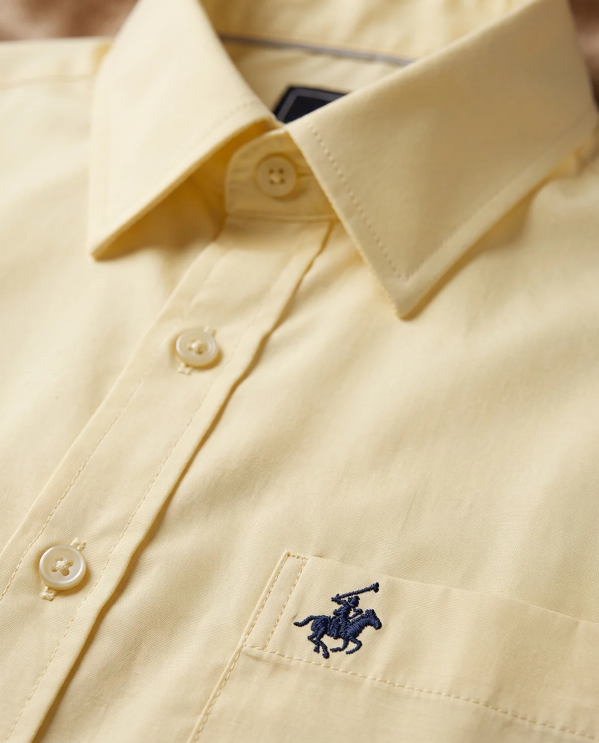 Short-Sleeve Button-Down in Cream, fabric and stitching detail