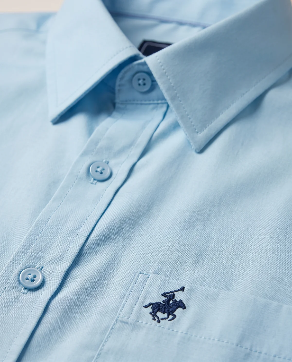 Short-Sleeve Button-Down in Light, fabric and stitching detail