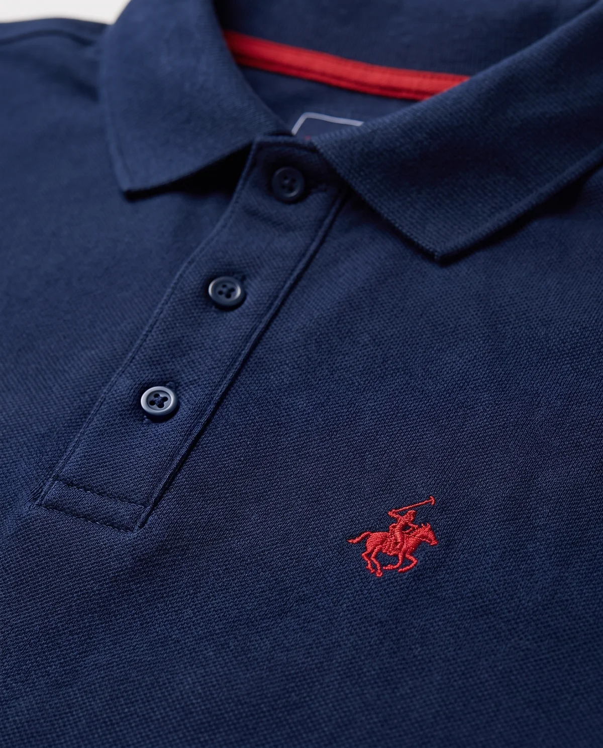 Piqué Polo in Navy, fabric and stitching detail