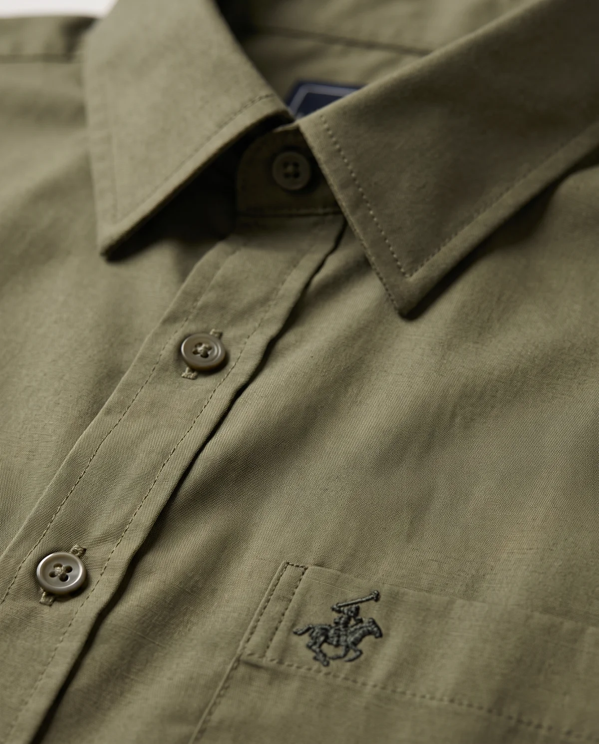 Short-Sleeve Button-Down in Olive, fabric and stitching detail