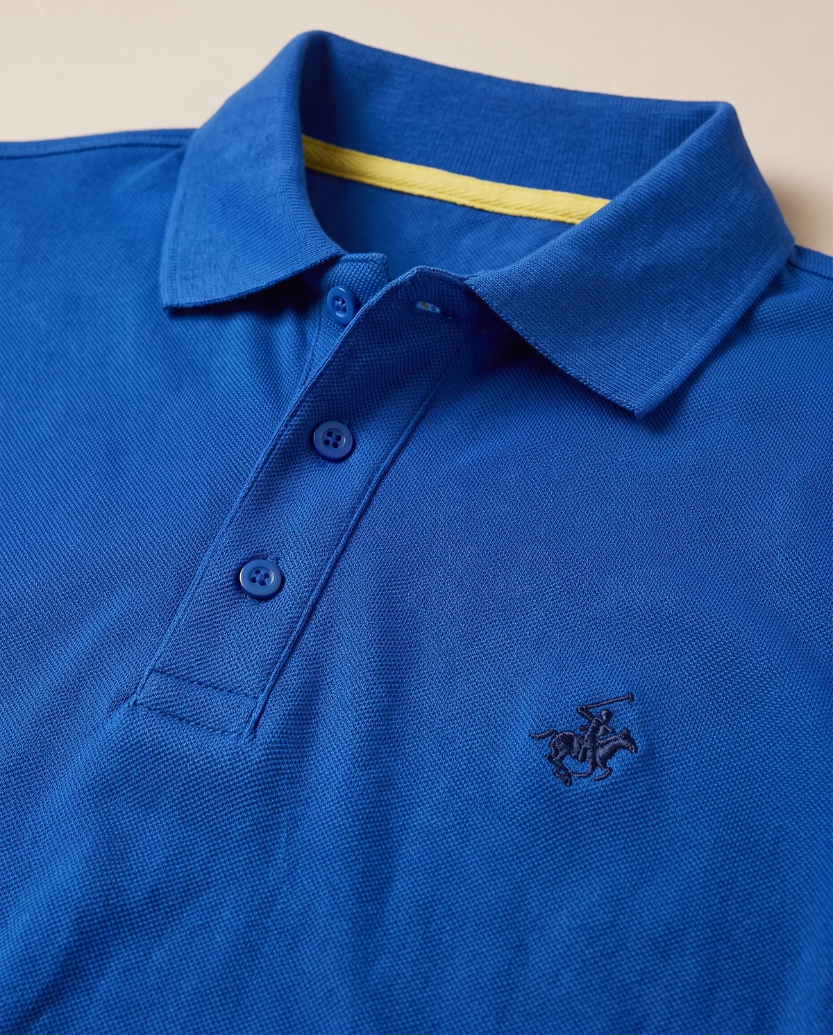 Piqué Polo in Royal, fabric and stitching detail