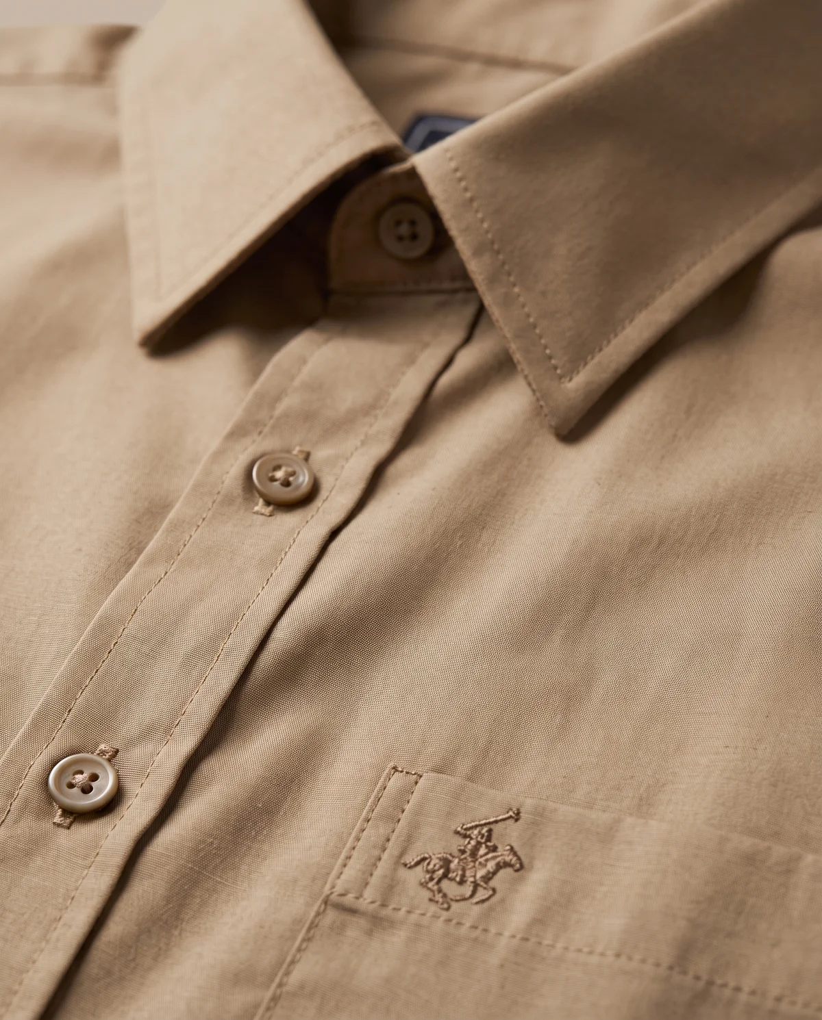 Short-Sleeve Button-Down in Tan, fabric and stitching detail