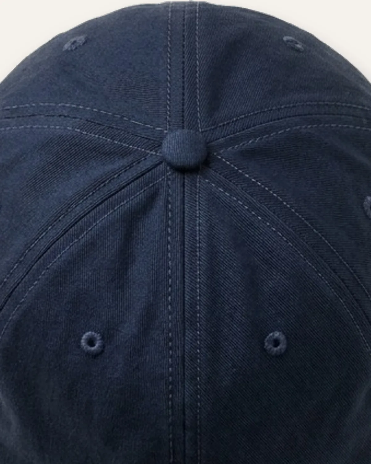 Unstructured Dad Cap in Navy, laid flat, detail